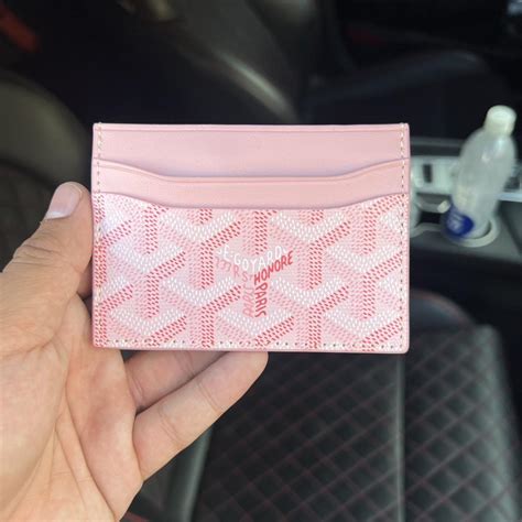 second hand pink goyard wallet.